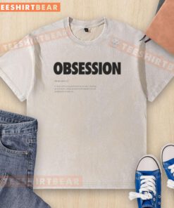 Minimalist dictionary design on a washed t-shirt featuring the definition of 'Good Obsession' for trendy fashion.