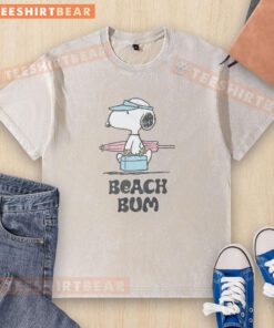 Good Peanuts Beach Bum Snoopy washed t-shirt featuring Snoopy relaxing on the beach, perfect for casual summer wear.