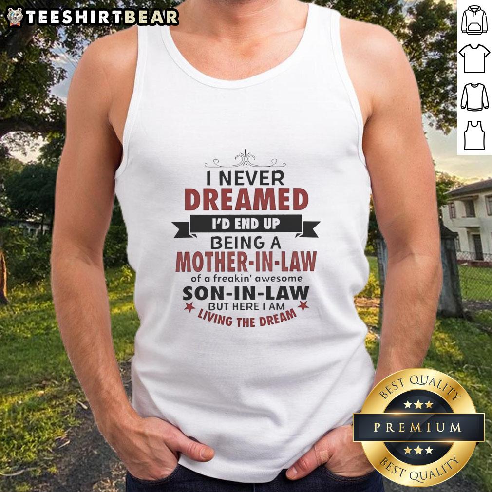 Woman wearing 'Hot I Never Dreamed I'd Be A Mother In Law Of A Freakin Awesome' tank top, showcasing playful family pride.