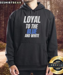 Alt Text: Stylish hot blue and white hoodie featuring a bold logo, perfect for fans showing loyalty to their team.