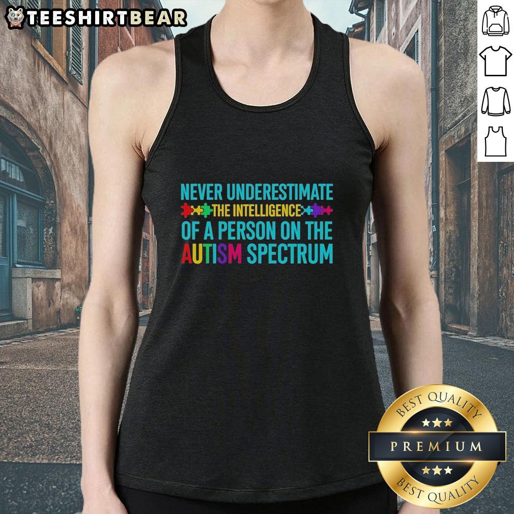 Alt Text: Hot tank top featuring the phrase 'Never Underestimate The Intelligence Of A Person On The Autism Spectrum'.