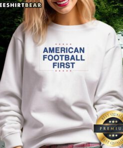 Nice American Football First Ban International Games Sweatshirt showcasing team pride and sporty design.
