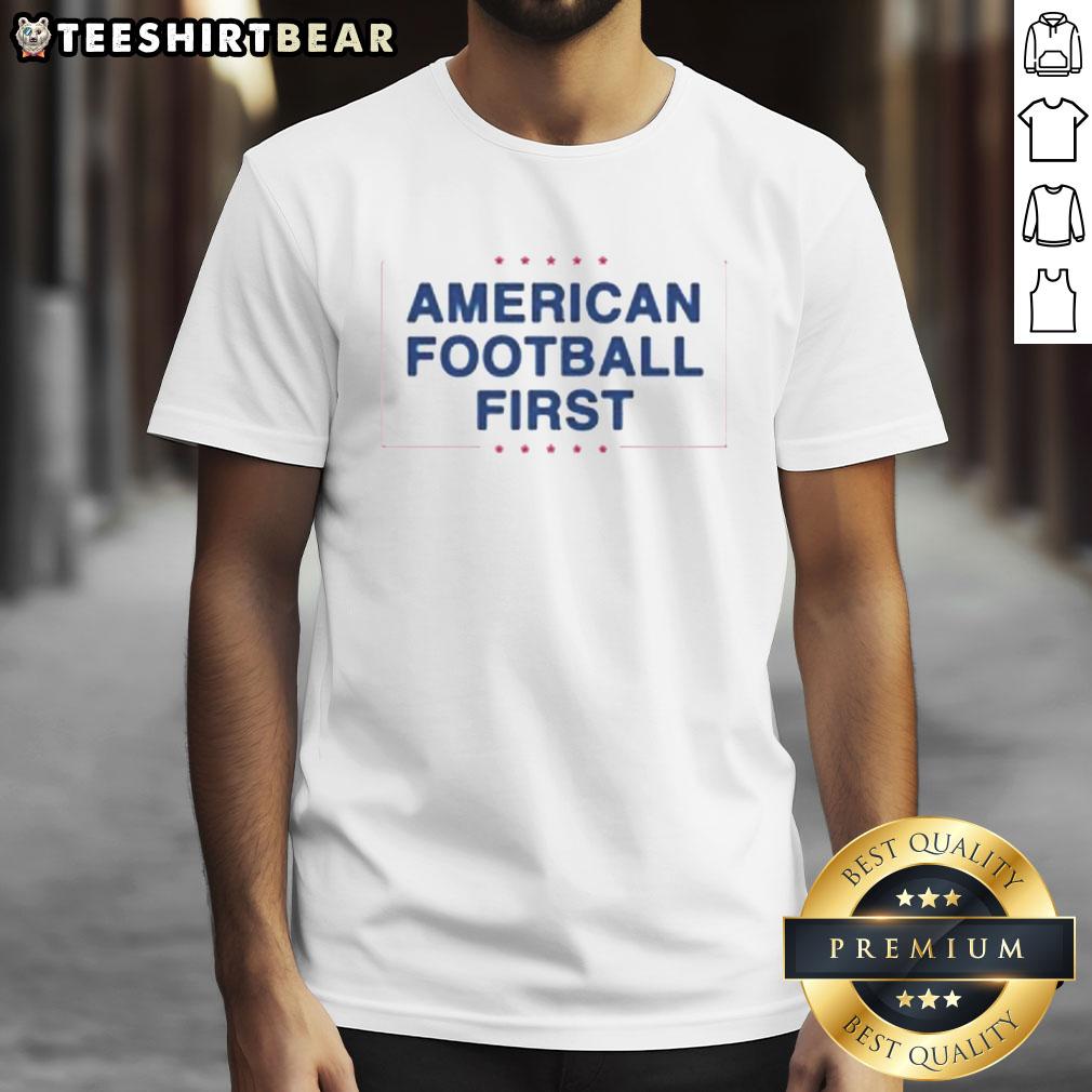 Nice American Football First Ban International Games T-Shirt featuring a vibrant design, perfect for fans and collectors.
