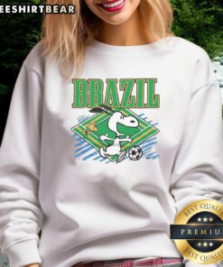 Nice Peanuts Snoopy X Brazil soccer sweatshirt featuring a playful design with Snoopy and soccer elements.