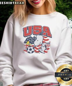 Alt Text: Cozy Nice Peanuts Snoopy X US Soccer sweatshirt featuring iconic Snoopy design, perfect for fans and chilly days.
