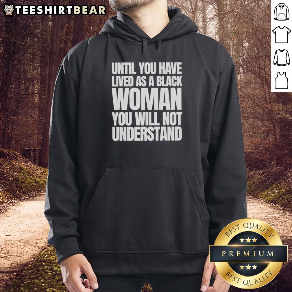 Black woman wearing 'Nice Until You Have Lived As A Black Woman' hoodie, showcasing empowerment and identity.