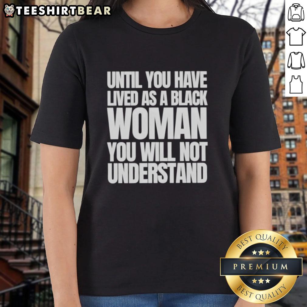 Black woman wearing 'Nice Until You Have Lived As A Black Woman' tee, showcasing empowerment and resilience.