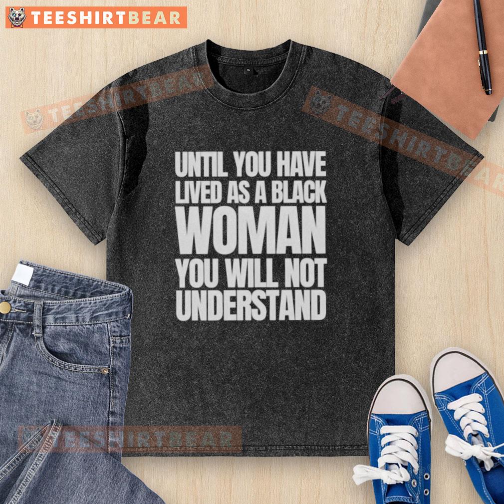 Black woman wearing 'Nice Until You Have Lived As A Black Woman' text washed t-shirt, showcasing powerful message on racial experience.