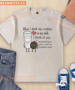 Washed T-shirt with 'Nice When I Dunk My Cookies In My Milk' graphic, perfect for cookie lovers and nostalgic moments.
