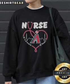 Alt Text: Official Arizona Diamondbacks Nurse It's A Work Of Heart sweatshirt with team logo and stylish design.