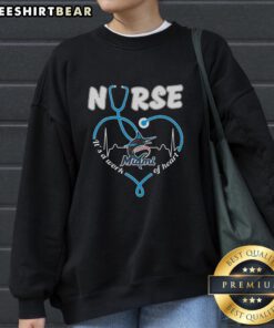 Alt Text: Original Miami Marlins Nurse 'It's A Work Of Heart' Sweatshirt featuring stylish design for dedicated fans.