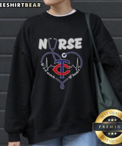 Original Minnesota Twins Nurse 'It's A Work Of Heart' Sweatshirt featuring team colors and heart design for fans.