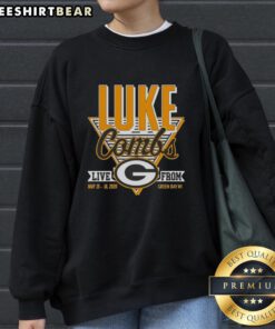 Premium Green Bay Packers Luke Combs sweatshirt from May 15-16, 2026, in Green Bay, WI, featuring team colors and logo.