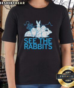 Premium See The Rabbits Blue Vintage Ladies Tee with a stylish graphic design, perfect for casual outfits.