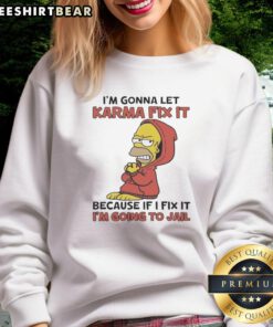 Funny Homer Simpson sweatshirt with 'I'm gonna let karma fix it' quote, perfect for casual wear and pop culture fans.