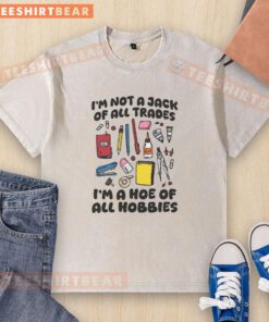 Pretty I'm Not A Jack Of All Trades I'm A Hoe Of All Hobbies washed t-shirt displayed on a wooden background.