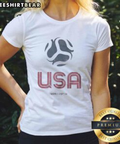 Alt Text: Pretty United States Home Advantage Soccer Ball World Cup 26 Ladies Tee featuring vibrant design and comfortable fit.