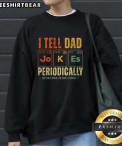 Alt Text: Cozy 'Top I Tell Dad Jokes Periodically' sweatshirt in a casual setting, perfect for dad joke enthusiasts.