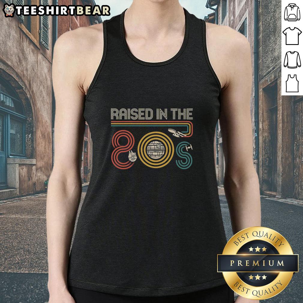 Top I Was Raised In The 80s tank top featuring vibrant retro design, perfect for nostalgic fashion lovers.