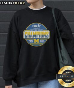 Alt Text: Michigan Wolverines 2026 Big Ten Women's Tennis Tournament champions sweatshirt in team locker room setting.