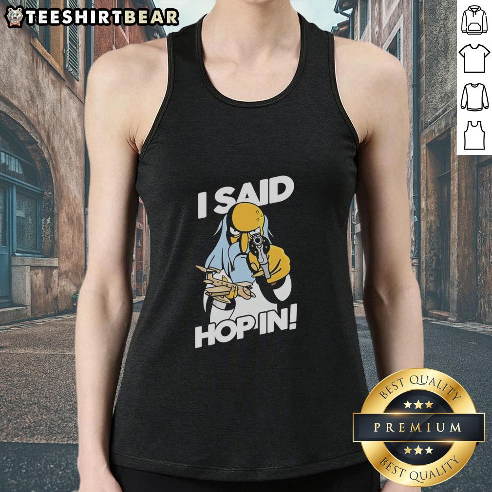 Alt Text: Mr. Burns holding a pistol and model aircraft in a meme tank top, featuring the phrase I said hop in.