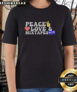 Retro ladies tee featuring 'Peace, Love, and Mixtapes' cassette design, perfect for music lovers and vintage enthusiasts.