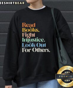 Retro sweatshirt featuring 'Top Read Books Fight Injustice' design, perfect for book lovers advocating for social change.