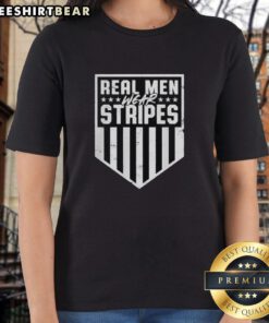 Vintage ladies tee featuring the slogan 'Top Real Men Wear Stripes' in a stylish design, perfect for casual wear.