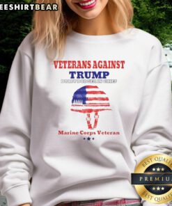 Alt Text: Top Veterans Against Draft Dodger In Chief sweatshirt worn by a Marine Corps veteran, showcasing military pride.