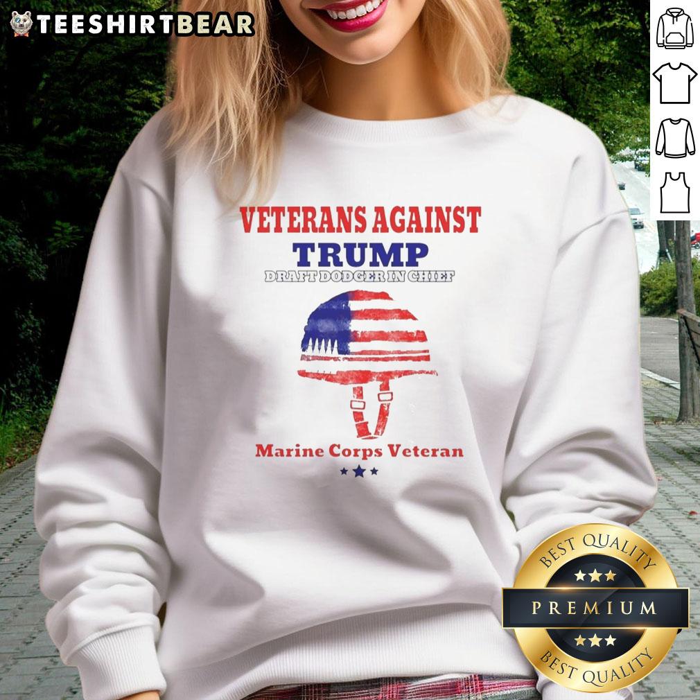 Alt Text: Top Veterans Against Draft Dodger In Chief sweatshirt worn by a Marine Corps veteran, showcasing military pride.
