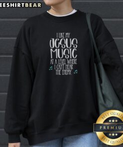 Awesome I Like Jesus My Music At A Level Where I Can'T Hear The Enemy Music Note Sweatshirt displayed on a hanger