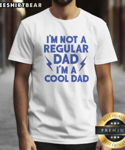 Good I'M Not A Regular Dad I'M A Cool Dad Shirt displayed on a hanger, showcasing its unique design.