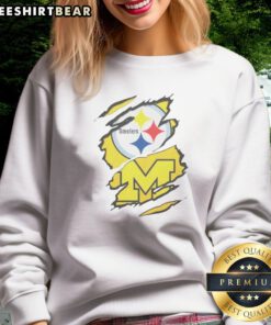 Good Pittsburgh Steelers Michigan Wolverines Torn Metal Logo Graphic Sweatshirt featuring a unique logo design
