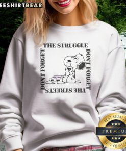 Good Snoopy Peanuts The Struggle Don'T Forget The Streets Dont Forget Sweatshirt featuring a fun graphic design.