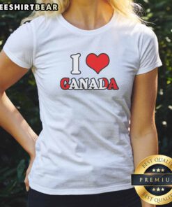 Hot I Love Canada Canadian Flag Maple Leaf National Pride My Home North America I Love Canada Ladies Shirt displayed on a hanger.