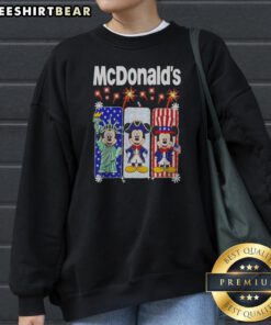 Hot Mcdonalds Mickey Mouse As Statue Of Liberty And Uncle Sam Patriotic Sweatshirt featuring bold patriotic graphic on cozy fabric