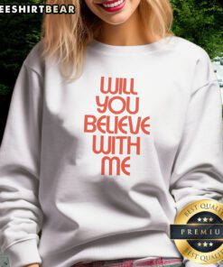 Hot Will You Believe With Me Sweatshirt in a cozy setting showcasing its vibrant design