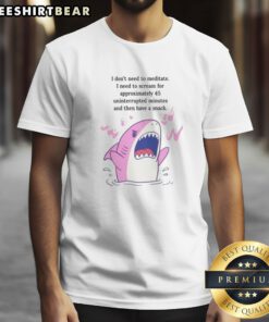 Original I Dont Need To Meditate I Need To Scream Pink Shark Funny Graphic Shirt displayed on a wooden background
