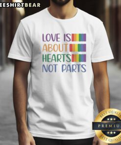 Original Love Is About Hearts Not Parts Pride Month Shirt displayed on a neutral background, showcasing vibrant colors.