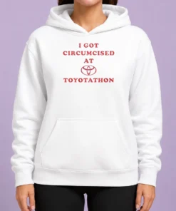 Premium I Got Circumcised At Toyotathon Funny Meme Hoodie in black, front view with bold white text graphic