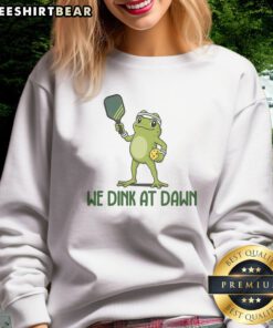 Premium We Dink At Dawn Pickle Ball Sweatshirt featuring a fun pickleball graphic.