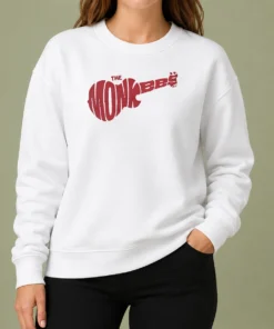 Top The Monkees Guitar Logo Sweater in dark color showing front design and comfortable fit