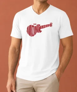 Top The Monkees Guitar Logo V Neck Shirt featuring a classic guitar graphic on a comfortable V neck garment