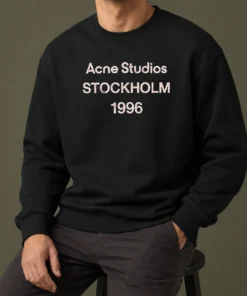 Funny Acne Studios Stockholm 1996 sweater in light grey with bold black text print on front