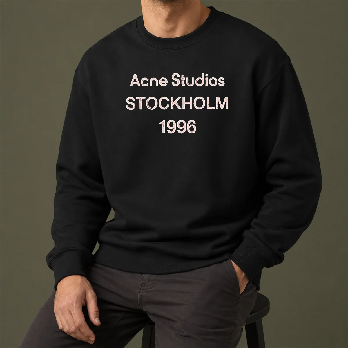 Funny Acne Studios Stockholm 1996 sweater in light grey with bold black text print on front