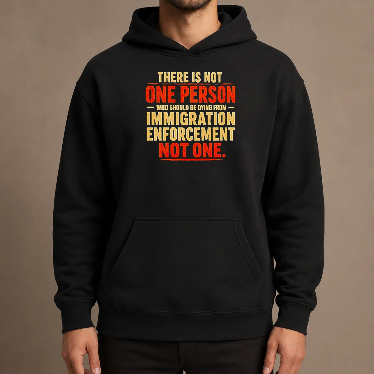 Good There Is Not One Person WHO Should Be Dying From Immigration Enforcement Hoodie in black, front view with bold white text