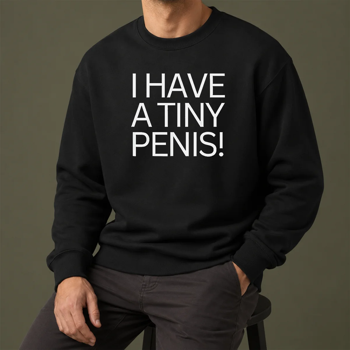 Official I Have A Tiny Penis Sweater in black with bold white text on front, long-sleeve crewneck sweatshirt