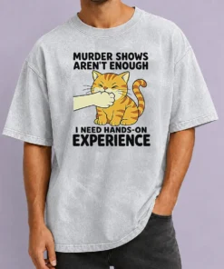 Premium Original Murder Shows Aren'T Enough I Need Hands On Experience Orange Cat Biting Hand printed on washed t shirt in orange