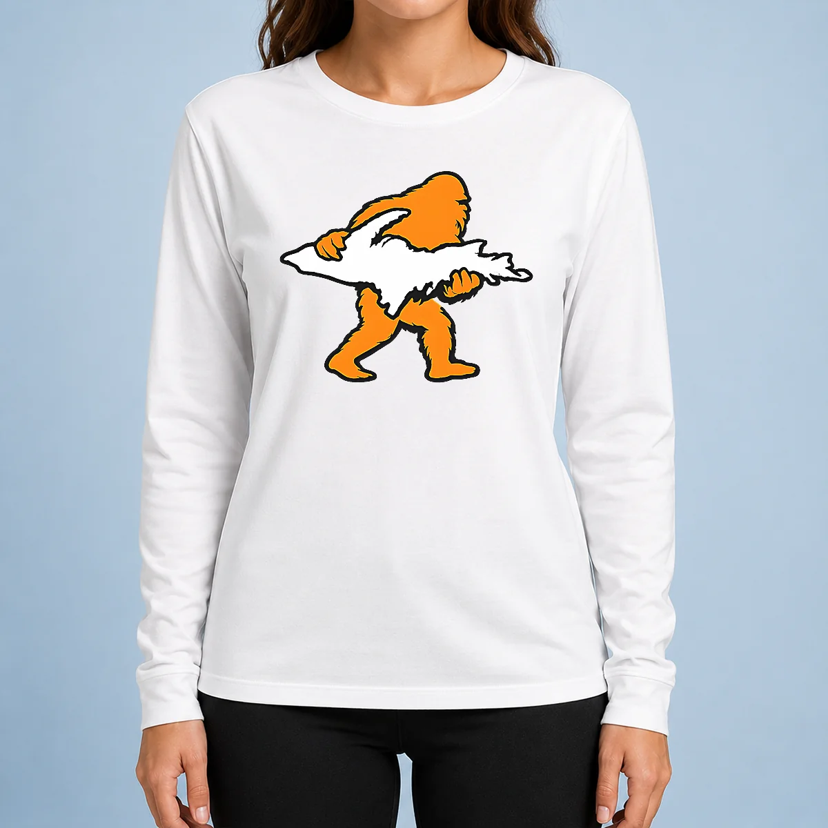Pretty Bigfoot Holding UP Of Michigan Upper Peninsula long sleeve shirt featuring a detailed graphic on a comfortable cotton fabric