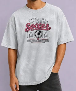 Pretty Nice Yup I'M A Soccer Mom Loud Proud Always There Washed T Shirt showing front design on a soft washed fabric